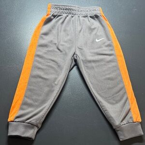 Nike Kids Joggers in Gray with Orange Stripes